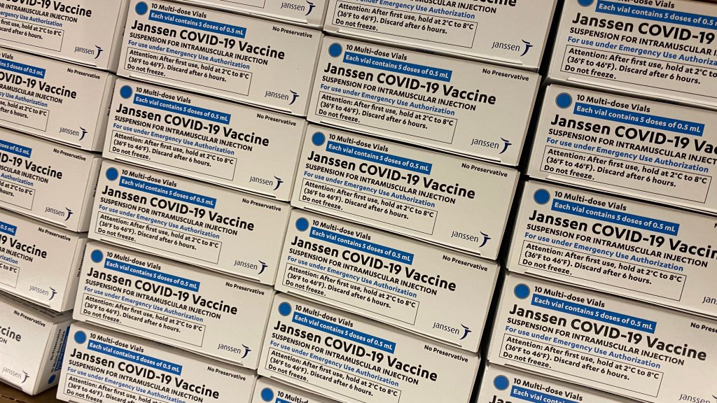 white boxes with black and blue text that read "Jansen COVID-19 vaccine"