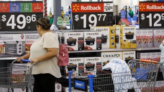A customer browses products at a Walmart store in Burbank, California