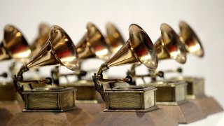 In this Oct. 10, 2017, file photo, various Grammy Awards are displayed at the Grammy Museum Experience at Prudential Center in Newark, New Jersey.