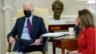 President Joe Biden, speaks with House Speaker Nancy Pelosi in the Oval Office of the White House, Friday, Feb. 5, 2021, in Washington.