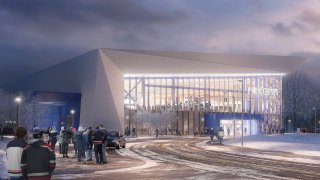 This artist rendering provided by the University of Connecticut, shows the proposed UConn Hockey Arena, approved by the school's Board of Trustees, Wednesday, April 28, 2021. The $70-million plan is for a 2,500-seat hockey rink on campus in Storrs, Conn., a facility that will be smaller and much more expensive than originally anticipated.