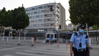 A policeman patrols outside the US embassy in Beijing on September 12, 2020.