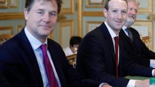 CEO and co-founder of Facebook Mark Zuckerberg poses next to Facebook head of global policy communications and former UK deputy prime minister Nick Clegg (L) prior to a meeting with French President at the Elysee Palace in Paris, on May 10, 2019.