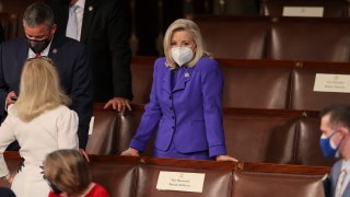 Representative Liz Cheney (R-WY) waits for US President Joe Biden to deliver his first address to a joint session of Congress at the US Capitol in Washington, DC, on April 28, 2021.