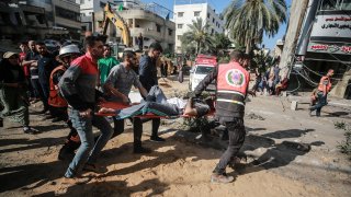 Search and rescue works are conducted at debris of a building after airstrikes by Israeli army hit buildings in al-Rimal neighborhood of Gaza City, Gaza on May 16, 2021.