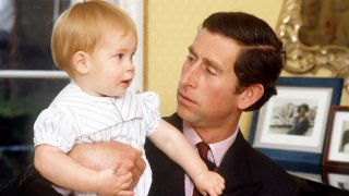 Prince Charles with Prince Harry at age one