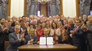 greg abbott shows heartbeat bill legislatiion