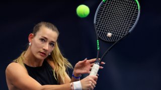 Russian Yana Sizikova poses for a photo during the Winter Moscow Open 2021 tennis tournament in Moscow, Russia, Wednesday, Feb. 24, 2021. The Paris prosecutor's office says a tennis player suspected of match-fixing last year has been arrested during the French Open. French newspaper Le Parisien reports that the player is 765th-ranked Yana Sizikova of Russia. The prosecutor's office tells The Associated Press that a "women's international player" was in custody but it did not identify her. The prosecutor's office says the player was arrested Thursday, June 3, 2021 on charges of "sports bribery and organized fraud for acts likely to have been committed in September 2020.