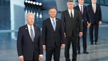 President Joe Biden and other NATO heads of the states and governments pose for a family photo