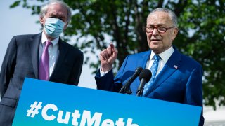 U.S. Senate Majority Leader Sen. Chuck Schumer (D-NY) (L) and Senator Ed Markey (D-MA) participate in a news conference about the Senate vote on methane regulation outside of the U.S. Capitol on April 28, 2021 in Washington, DC.