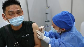 A Taiwan compatriot receives a dose of COVID-19 vaccine free of charge at a hospital on June 4, 2021 in Nanchang, Jiangxi Province of China.