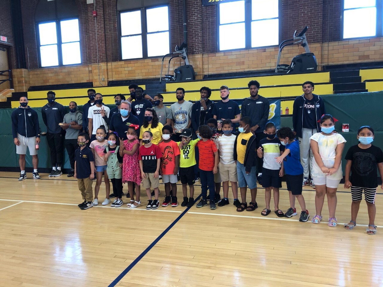 UConn Men’s Basketball Team Cheers on Graduates at E.B. Kennelly School