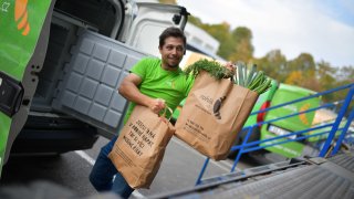 A courier for Czech grocery delivery start-up Rohlik.