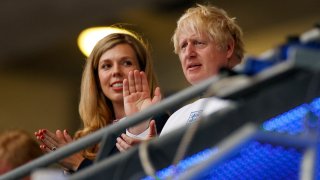 British Prime Minister Boris Johnson and his wife Carrie watch the Euro 2020 soccer championship final