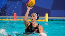 United States' Kaleigh Gilchrist plays against Japan during a preliminary round women's water polo match at the 2020 Summer Olympics, Saturday, July 24, 2021, in Tokyo, Japan.