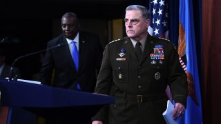US Defense Secretary Lloyd Austin (L) and Chairman of the Joint Chiefs of Staff, General Mark Milley, hold a press conference on July 21, 2021, at The Pentagon in Washington, DC.