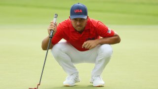 Xander Schauffele of Team United States lines up a putt on the 13th green during the second round of the Men's Individual Stroke Play on day seven of the Tokyo 2020 Olympic Games.