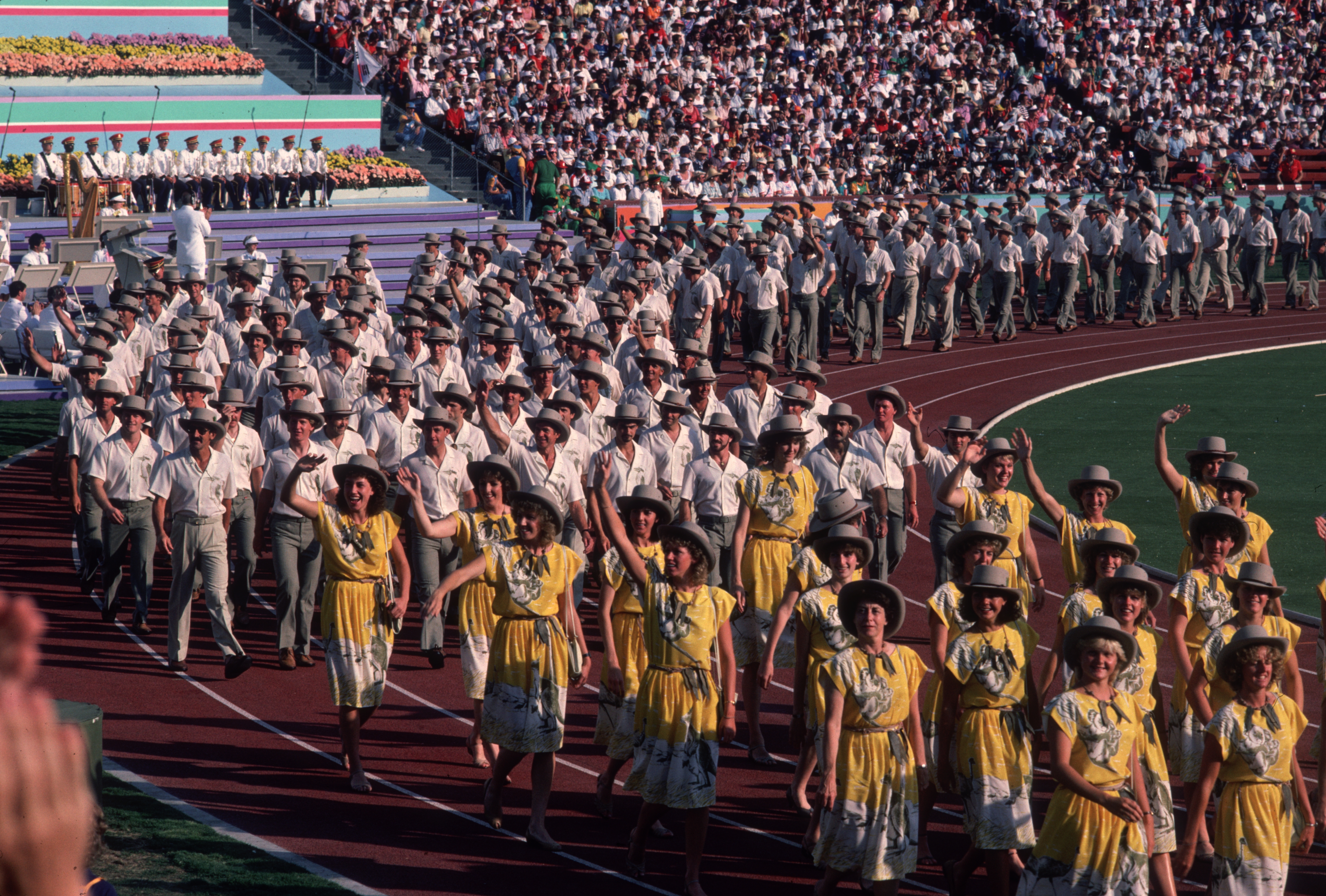 1984:  Athletes in costume march in the opening ceremony parade at the Summer Olympics, Olympic Stadium, Los Angeles, California.  (Photo by Hulton Archive/Getty Images)