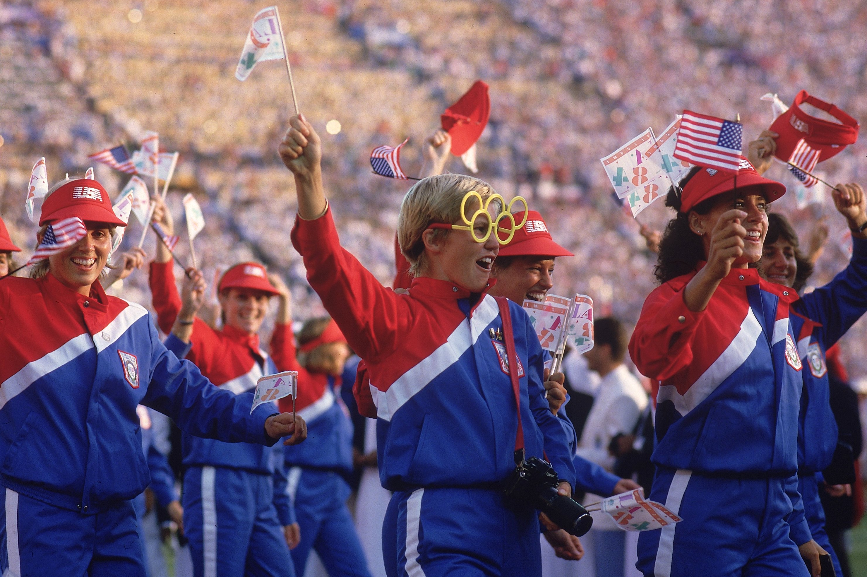 Sporting Olympic rings eyewear, Team USA's delegation is pictured during the procession at Memorial Coliseum. CREDIT: Ronald C. Modra (Photo by Ronald C. Modra /Sports Illustrated via Getty Images) (Set Number: X30350 )