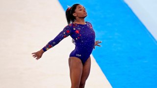 Simone Biles competes on floor