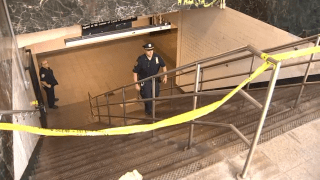 Police investigate a violent assault after two people were thrown down stairs at the Canal Street Station.