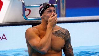 Caeleb Dressel shows his emotion after winning gold
