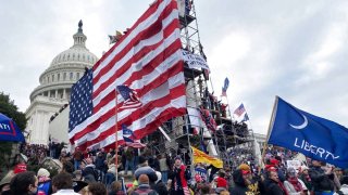 Supporters of Donald Trump gather outside the Capitol building in Washington D.C., on January 06, 2021.