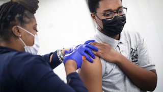 U.S. Reaches 70% Covid Vaccine Milestone for Adults About a Month Behind Biden’s Goal