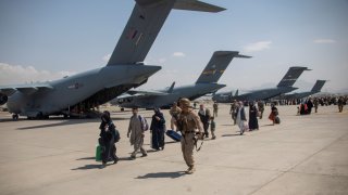 Members of the UK Armed Forces continue to take part in the evacuation of entitled personnel from Kabul airport, in Kabul, Afghanistan August 19-22, 2021, in this handout picture obtained by Reuters on August 23, 2021.