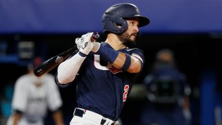 FILE - Infielder Eddy Alvarez of Team USA hits a single in the third inning against Team Japan during the gold medal game at the Tokyo 2020 Olympic Games at Yokohama Baseball Stadium, Aug. 7, 2021, in Yokohama, Kanagawa, Japan.