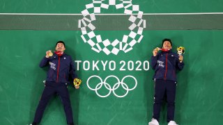 Chinese Taipei men's badminton gold medalists Wang Chi-Lin, left and Lee Yang.