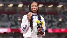 Bronze medalist Allyson Felix of Team USA holds up her medal on the podium during the medal ceremony for the women's 400m on day fourteen of the Tokyo 2020 Olympic Games at Olympic Stadium on Aug. 6, 2021, in Tokyo, Japan. Felix became the most decorated female athlete for track and field with her bronze medal win.
