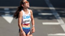 Molly Seidel celebrates a bronze