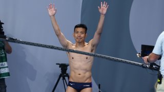 Ken Terauchi of Japan thanks the spectators after his final dive in the men's 3m springboard final on day eleven of the Tokyo 2020 Olympic Games at Tokyo Aquatics Centre on August 03, 2021.