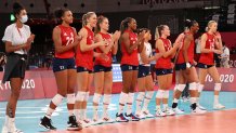 The U.S. women's volleyball team claps for Team Italy after a women's volleyball preliminary round game at the Tokyo Olympics.