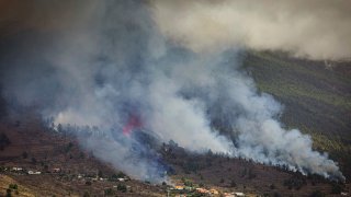 Smoke rises at the Cumbre Viegja volcanic on the island of La Palma in the Canaries, Spain
