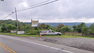 A road sign promoting the Haunted Hills Hayride in North Versailles, Pennsylvania.