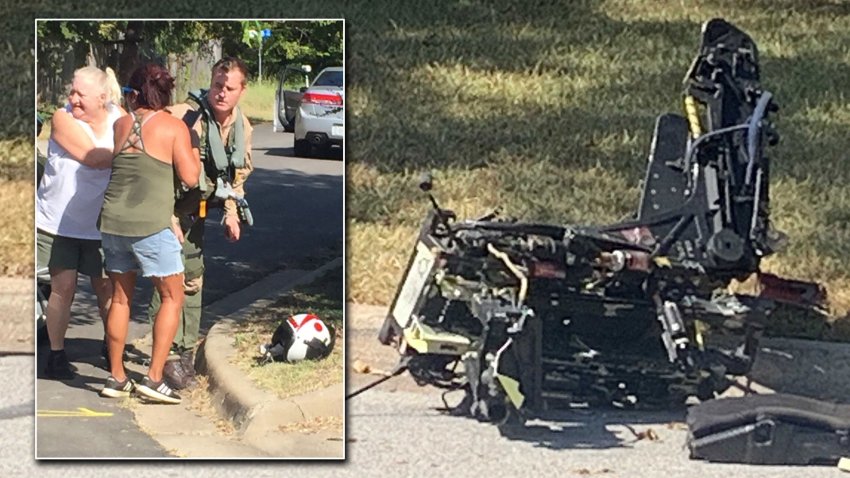 Kim Watson shared this photo of Lake Worth citizens helping a naval aviator who ejected from  his T-45C Goshawk jet trainer aircraft Sunday, Sept. 19, 2021. The jet crashed in a Lake Worth neighborhood — there were no reported injuries on the ground and homes suffered on minor damage. The crew of two were assigned to the Training Air Wing 2 at Naval Air Station Kingsville, Texas, near Corpus Christi.