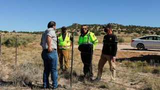 Security guards and a compliance officer at New Mexico’s Bonanza Creek Ranch on Oct. 22, 2021, the film set where actor Alec Baldwin fatally shot cinematographer Halyna Hutchins and wounded a director when he discharged a prop gun.