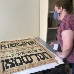 Staff members from the YIVO Institute for Jewish Research digitize pre-war materials.