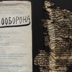 Documents like a self-defense journal, left, and pieces of a damaged Torah scroll, right, are also part of the collection.