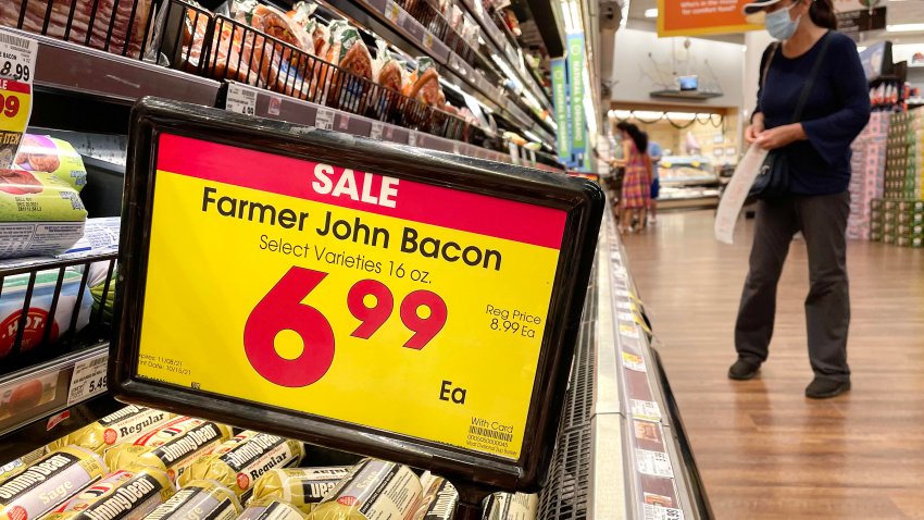 A person shops in the meat section of a grocery store on November 11, 2021 in Los Angeles, California.