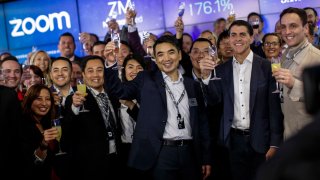 Zoom CEO Eric Yuan makes a toast after the Nasdaq opening bell ceremony in New York on April 18, 2019.