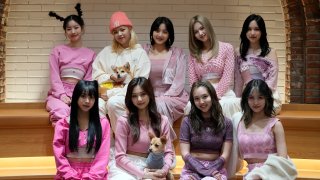 South Korean K-pop group TWICE poses for a photo after an interview in Seoul, South Korea, Wednesday, Nov. 10, 2021. TWICE, the nine-member K-pop band with over nine million Twitter followers, says they feel the growing popularity of the band and K-pop overseas.