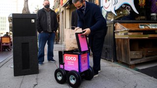 Coco human remote-controlled food delivery robot