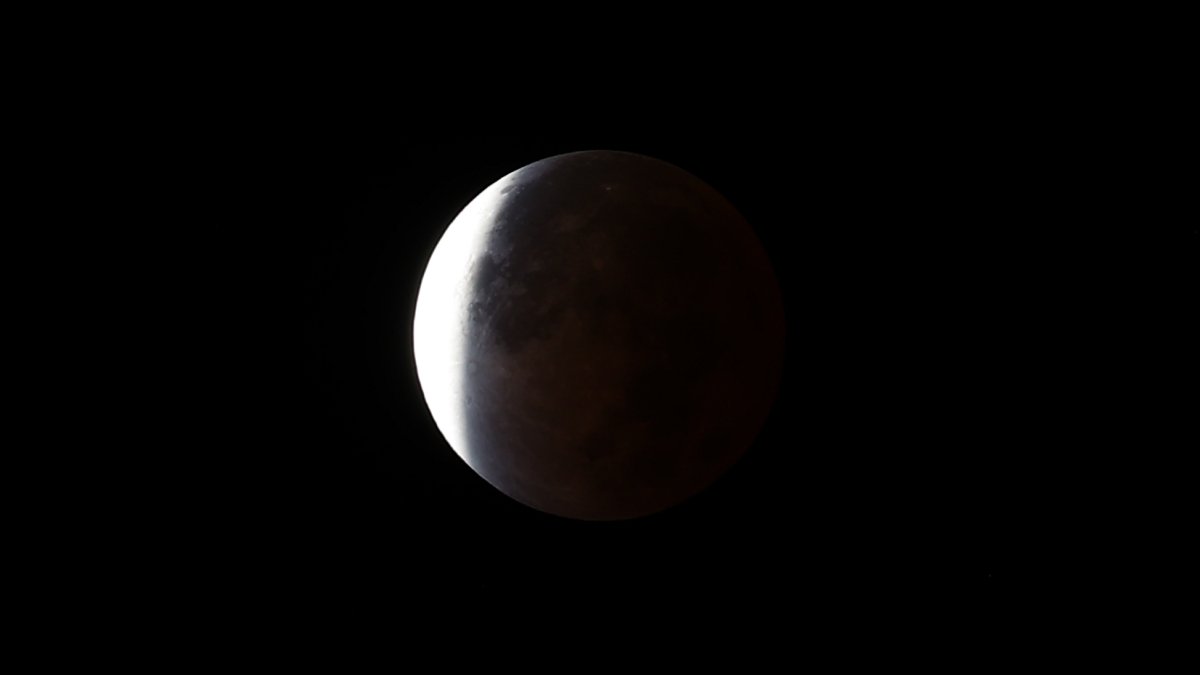 How to watch Tuesday’s Harvest supermoon with a partial lunar eclipse