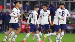 Christian Pulisic #10 of United States celebrate with his teammates after scoring his team's first goal during the FIFA World Cup Qatar 2022 qualifiers match between United States and Mexico at TQL Stadium on November 12, 2021 in Cincinnati, Ohio.