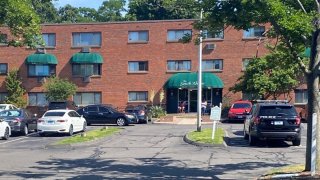 A teen was found dead in the basement of a Manchester apartment building after being reported missing, according to her family.