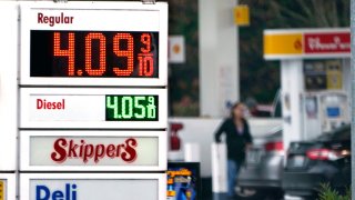 A driver fills a tank