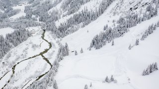 Aerial view shows traces of avalanches in the Lana district of the snowbound village of Kals, eastern Tyrol